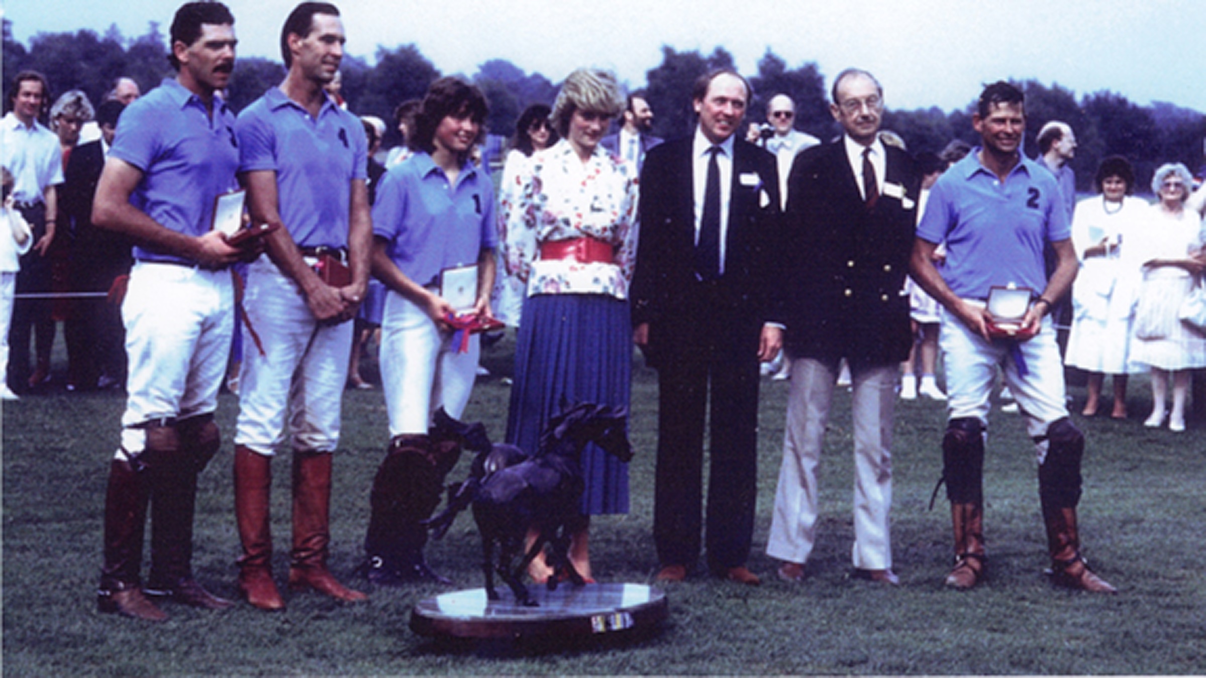Victoria and her father Peter Grace OBE, being awarded the Dorchester Trophy at Guards Polo Club by Princess Diana having played against HRH Prince of Wales